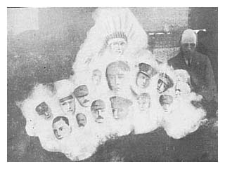 Photograph from Faces of the Living Dead; Remembrance Day Messages and Photographs, of faces in a white cloud. Image © Senate House Library, University of London